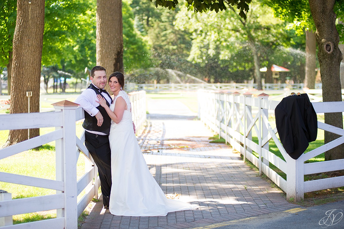 beautiful photo of bride and groom at saratoga racetrack