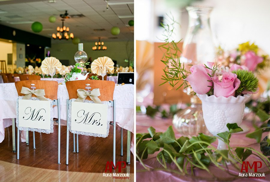 Mr & Mrs signs on the sweetheart table and chairs with pink rose centerpieces. © Aura Marzouk Photography