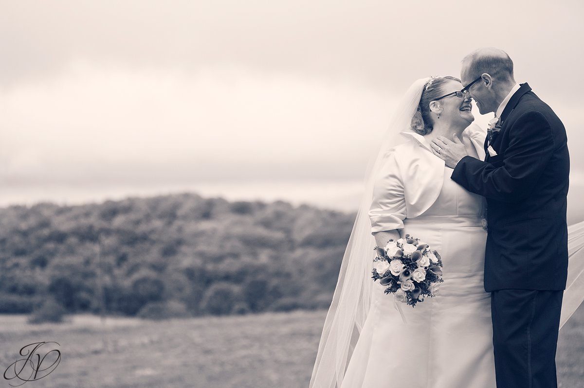bride and groom kissing, Lake George Wedding Photographer, Wedding at The Queensbury Hotel