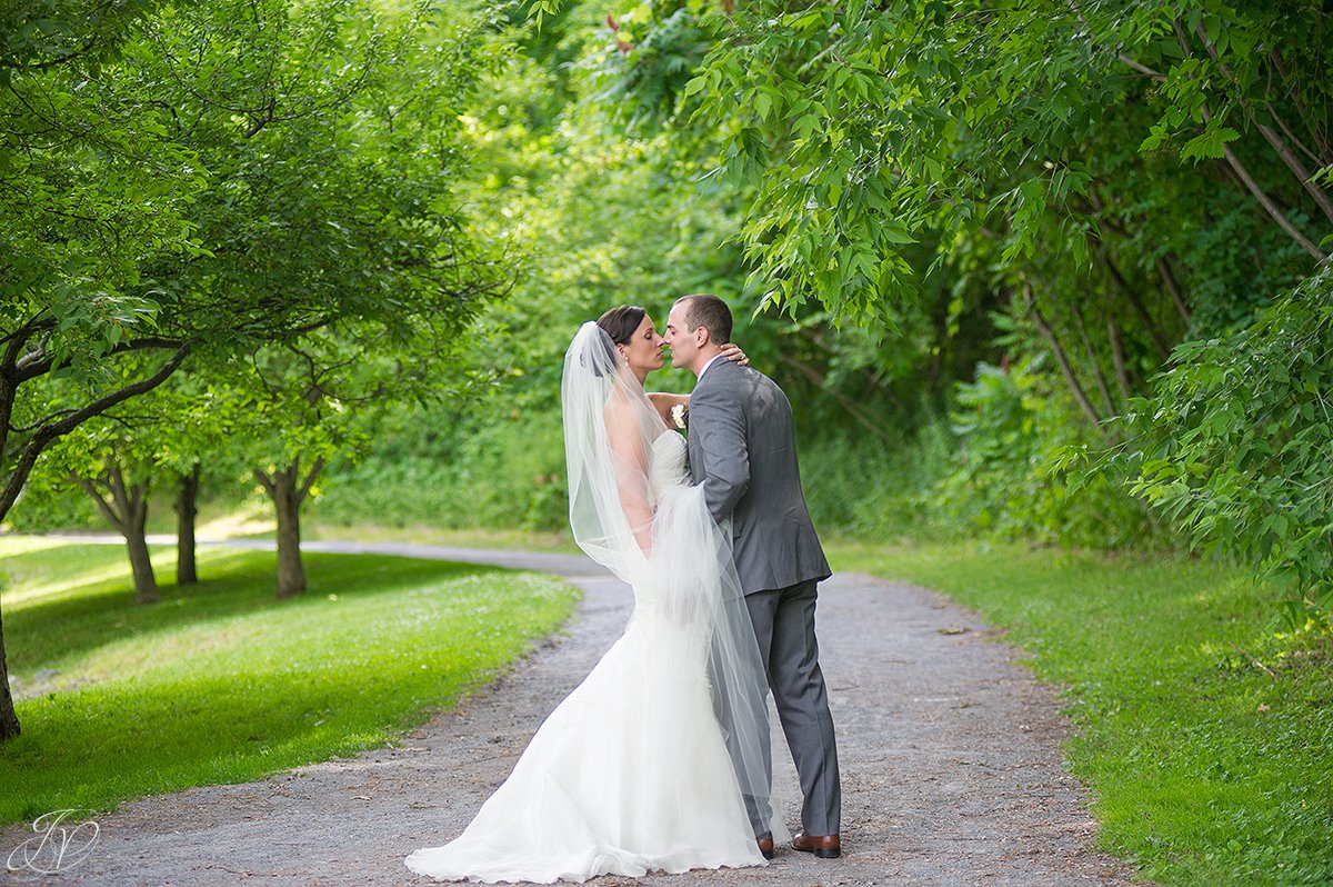 romantic photo of bride and groom in park saratoga wedding photographer
