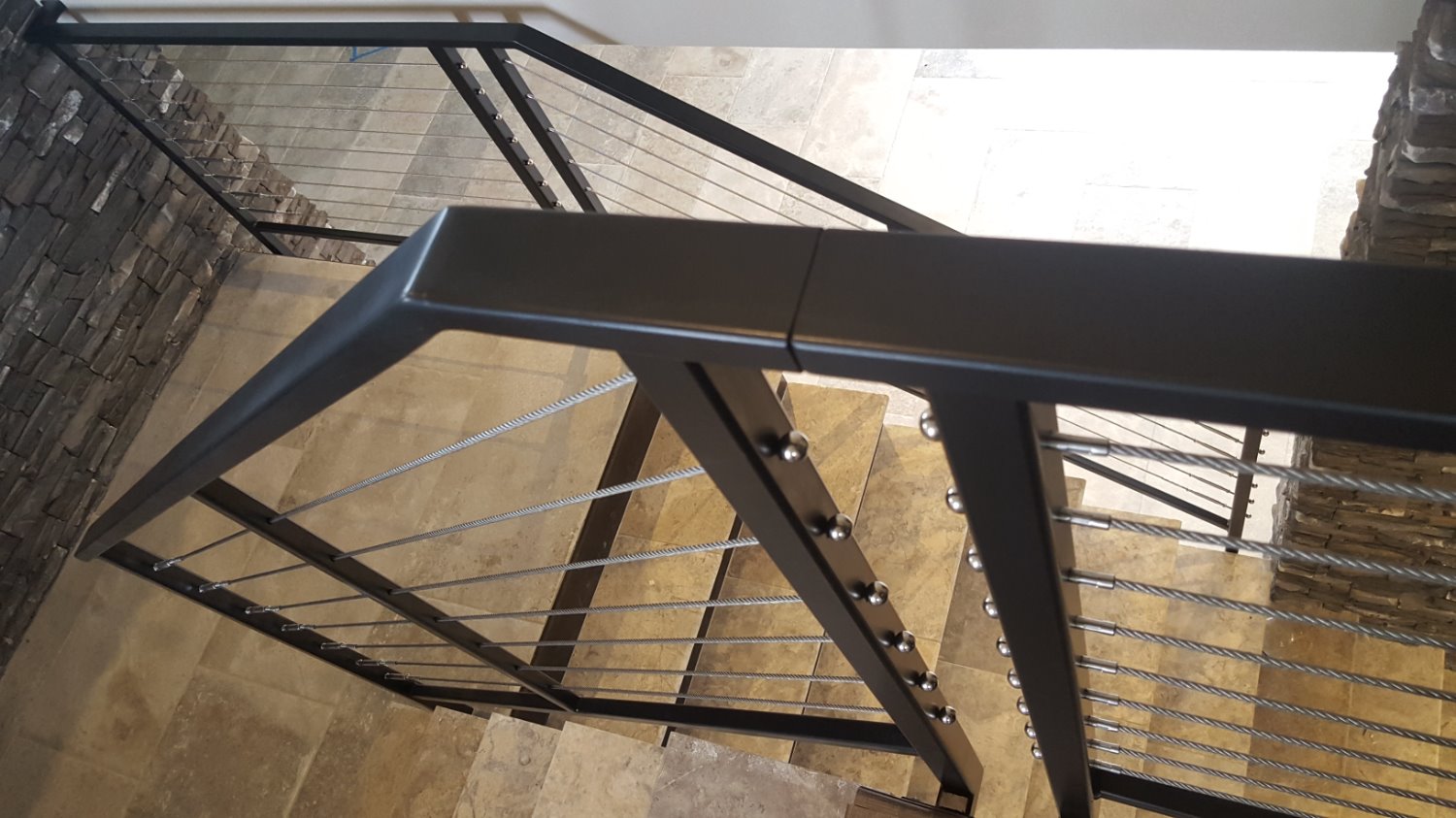 Top rail splice with no exposed flanges or hardware for a truly custom finish.