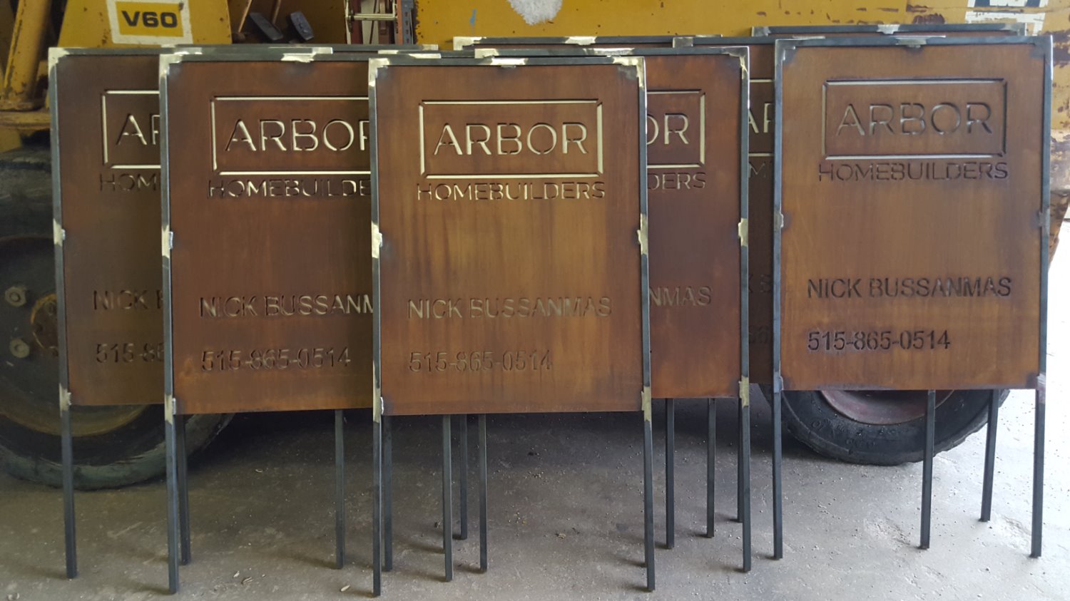 Corten jobsite sign with stainless steel back drop for Arbor Homes.