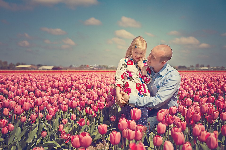 Jason and Caitlin in the tulips at Keukenhof - Houston family photographer