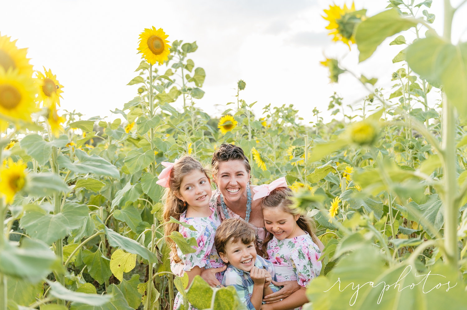 motherhood, sunflower portraits, mother with children in sunflower field, Rya Duncklee Photography