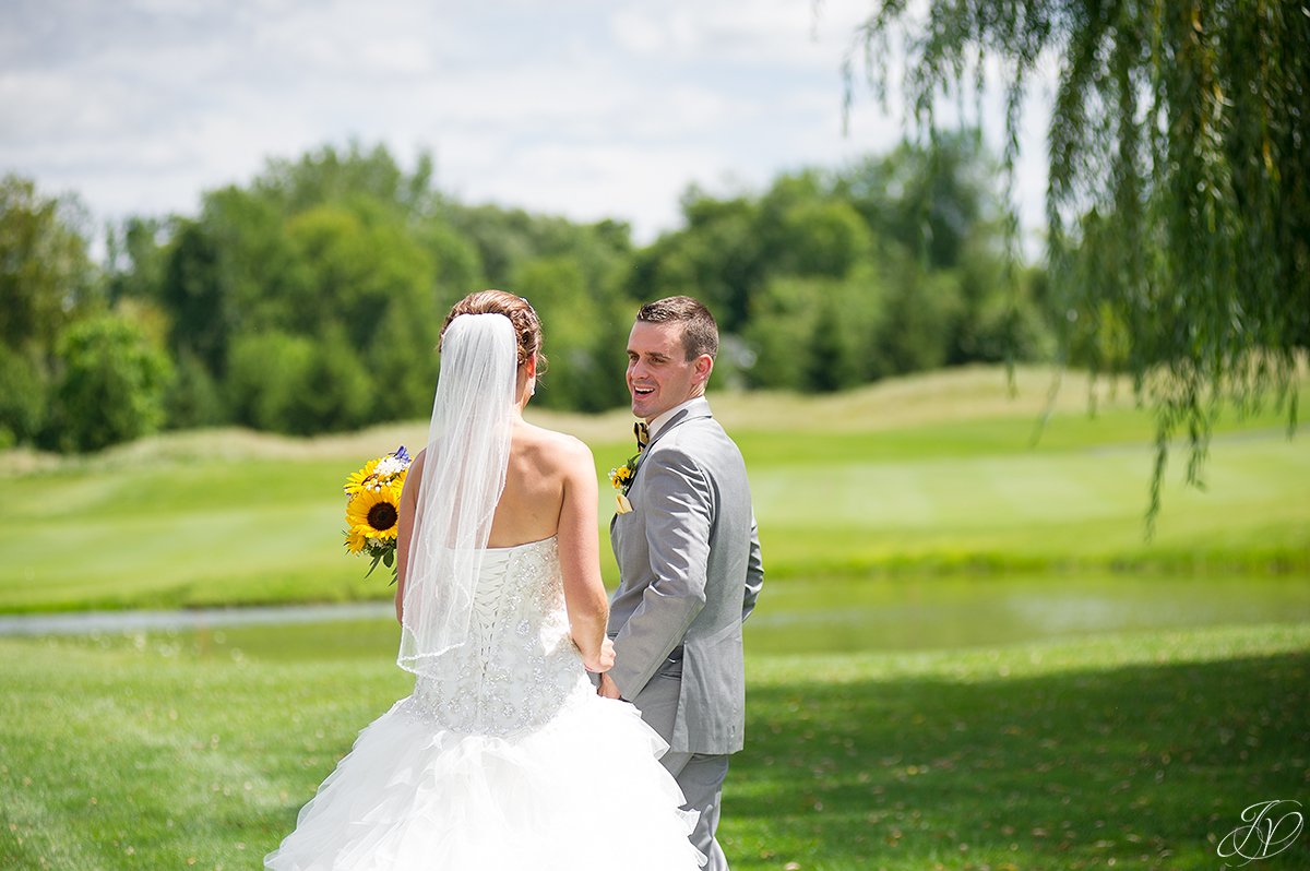 bride and groom first look at Timberlodge at Arrowhead Golf Club