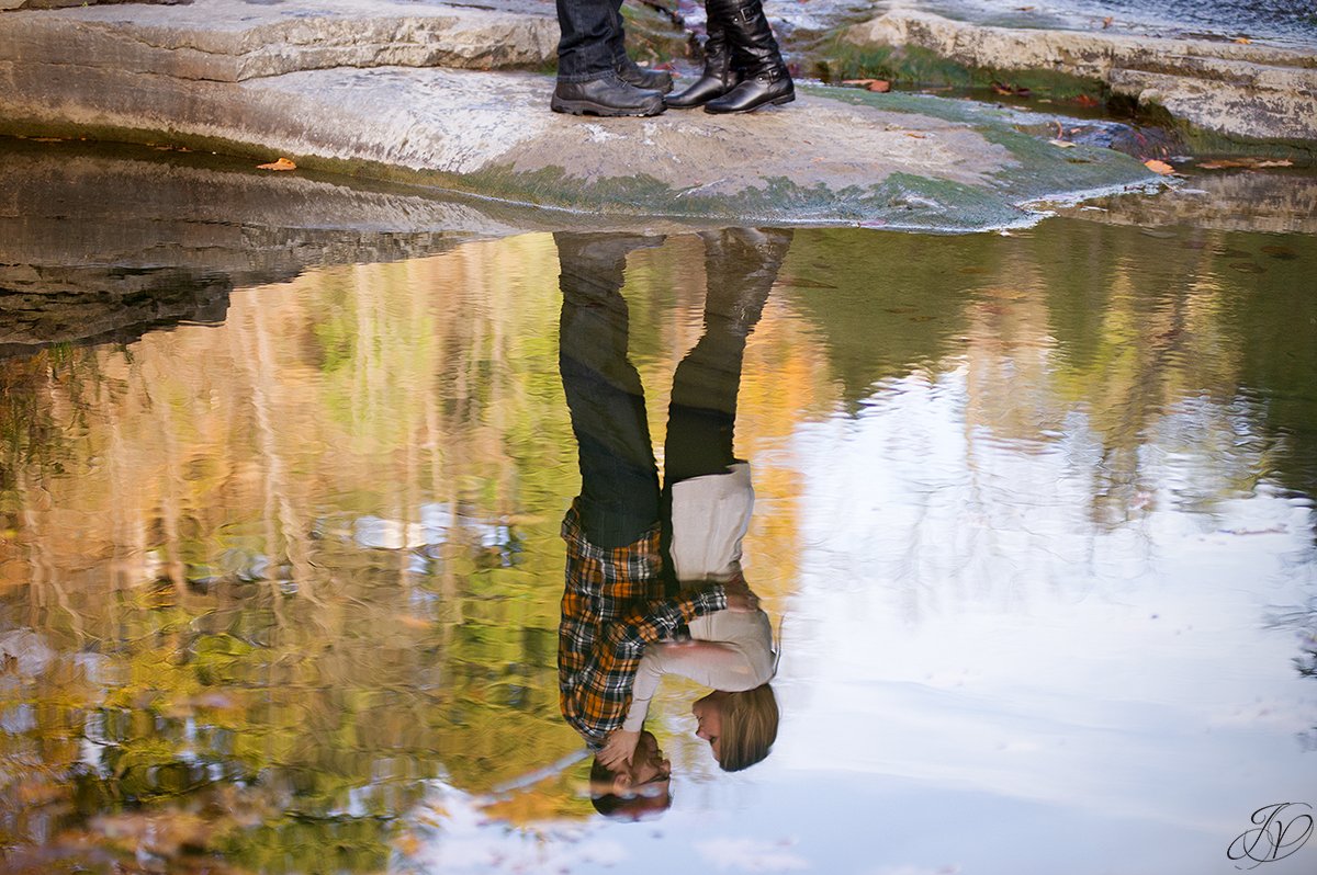 romantic fall engagement pictures water reflection
