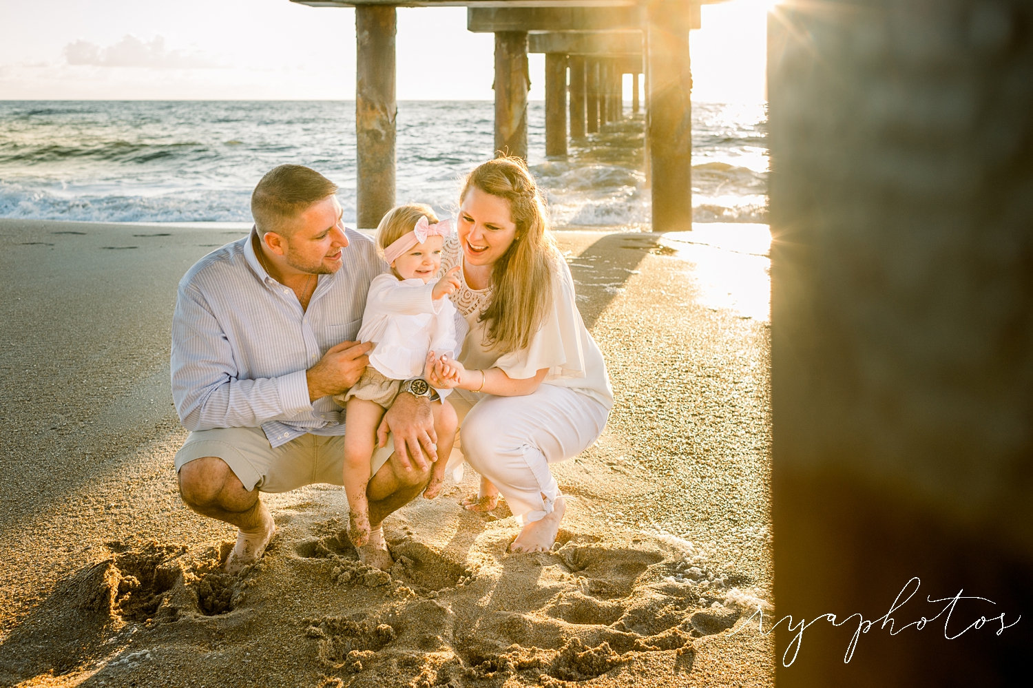 family of three, father, mother, daughter, Saint Augustine Beach, Florida