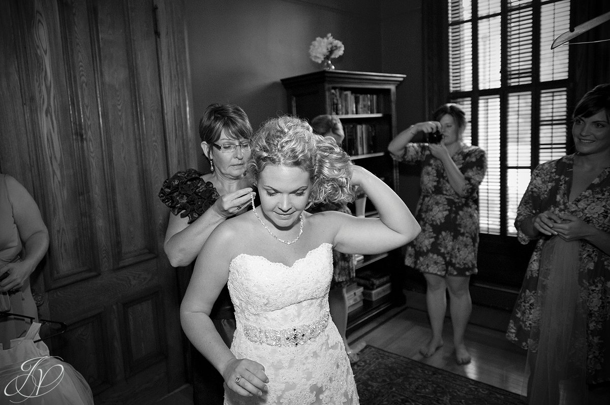 bride and mother getting ready, getting wedding dress on, getting ready wedding photo, Saratoga Wedding Photographer, The Mansion Inn rock city falls