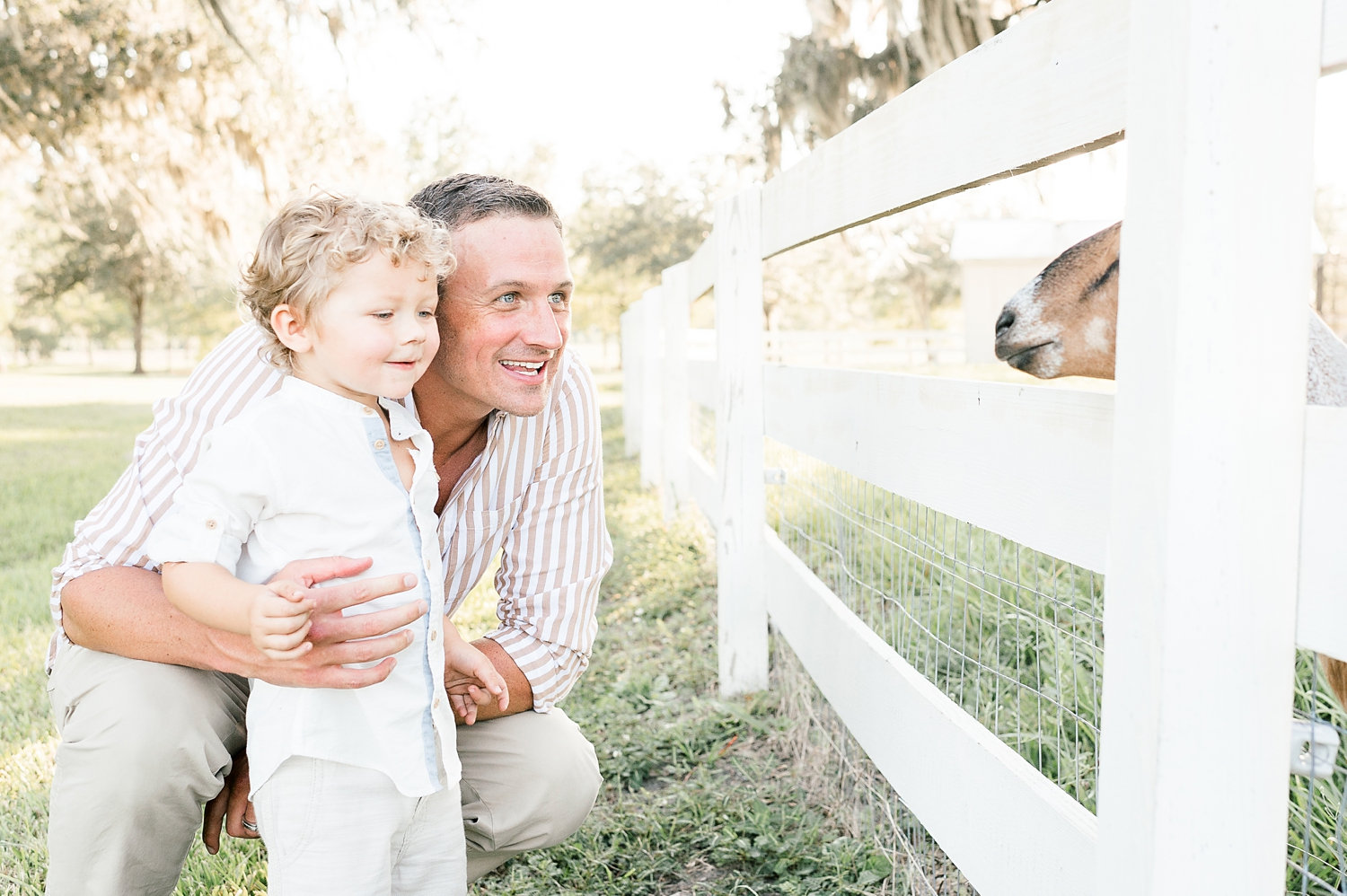 father and son, Ryan Lochte kids, goat, Congaree and Penn, farm family photo session