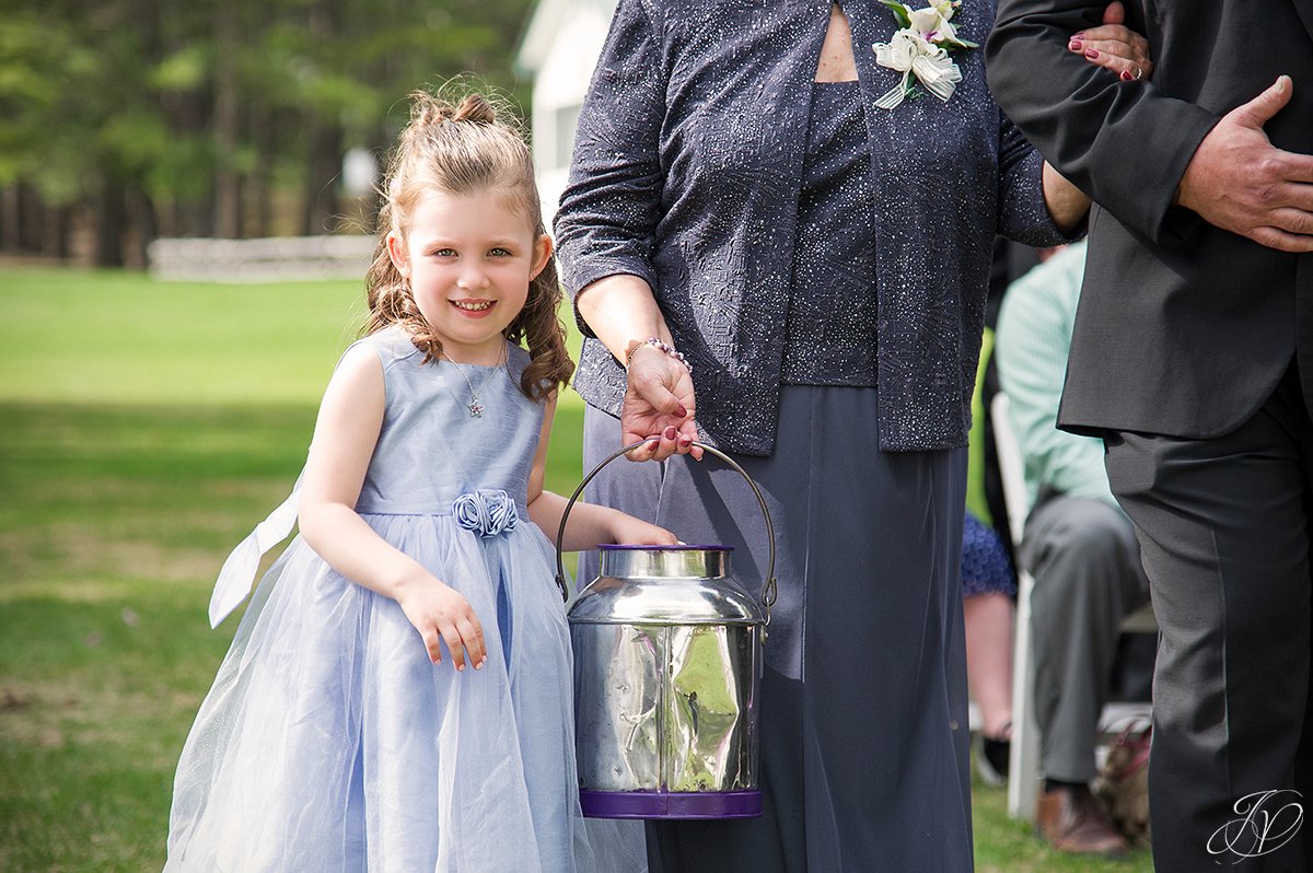 cute photo of flower girl coming down the aisle