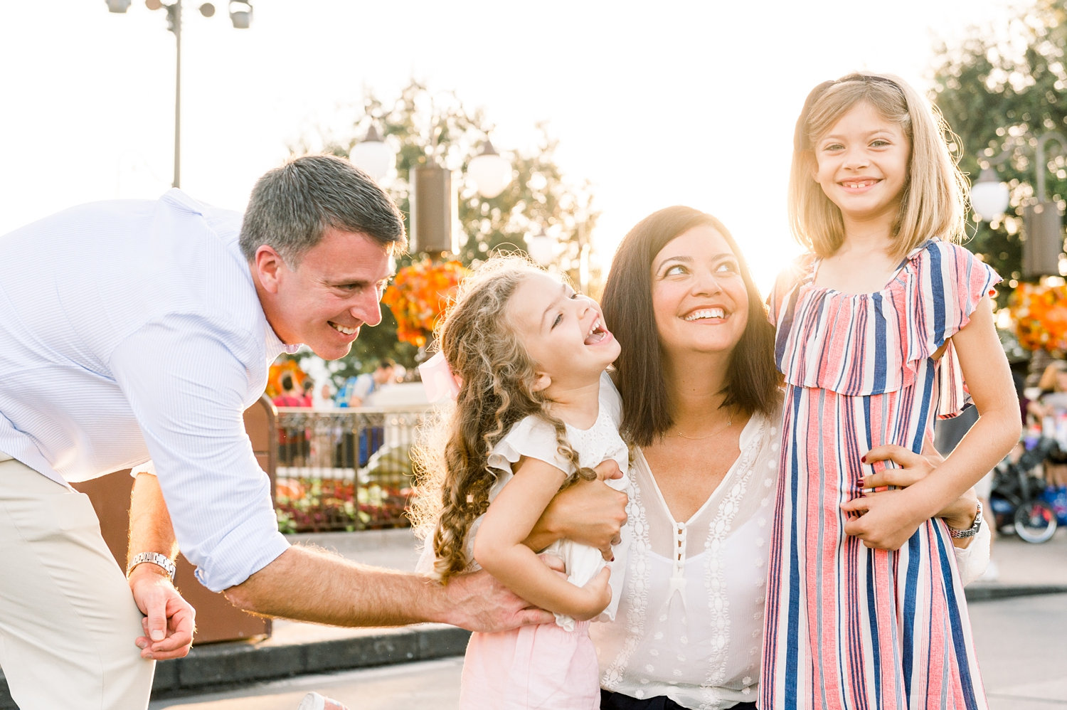 happy, smiling family of four, Walt Disney World, Magic Kingdom