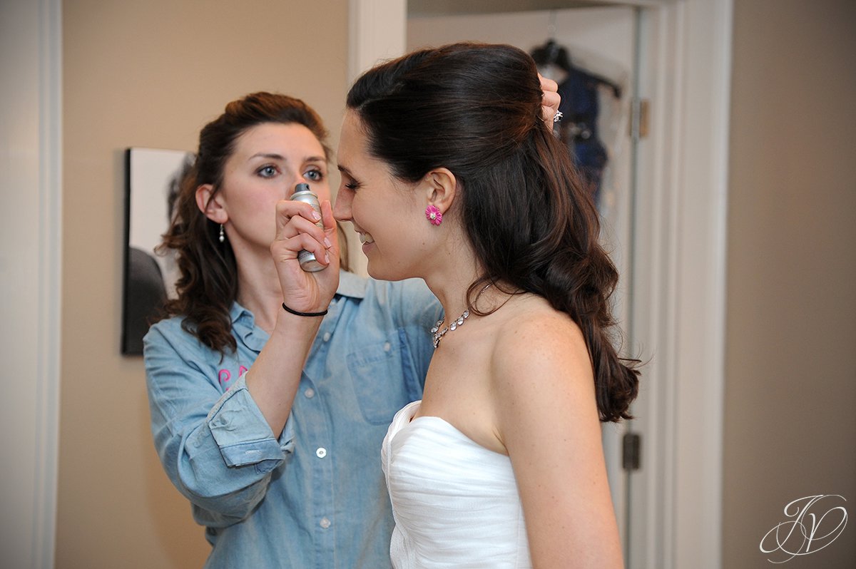 final wedding touches photo, makeup final touches, Albany Wedding Photographer, Wedding at The Crooked Lake House