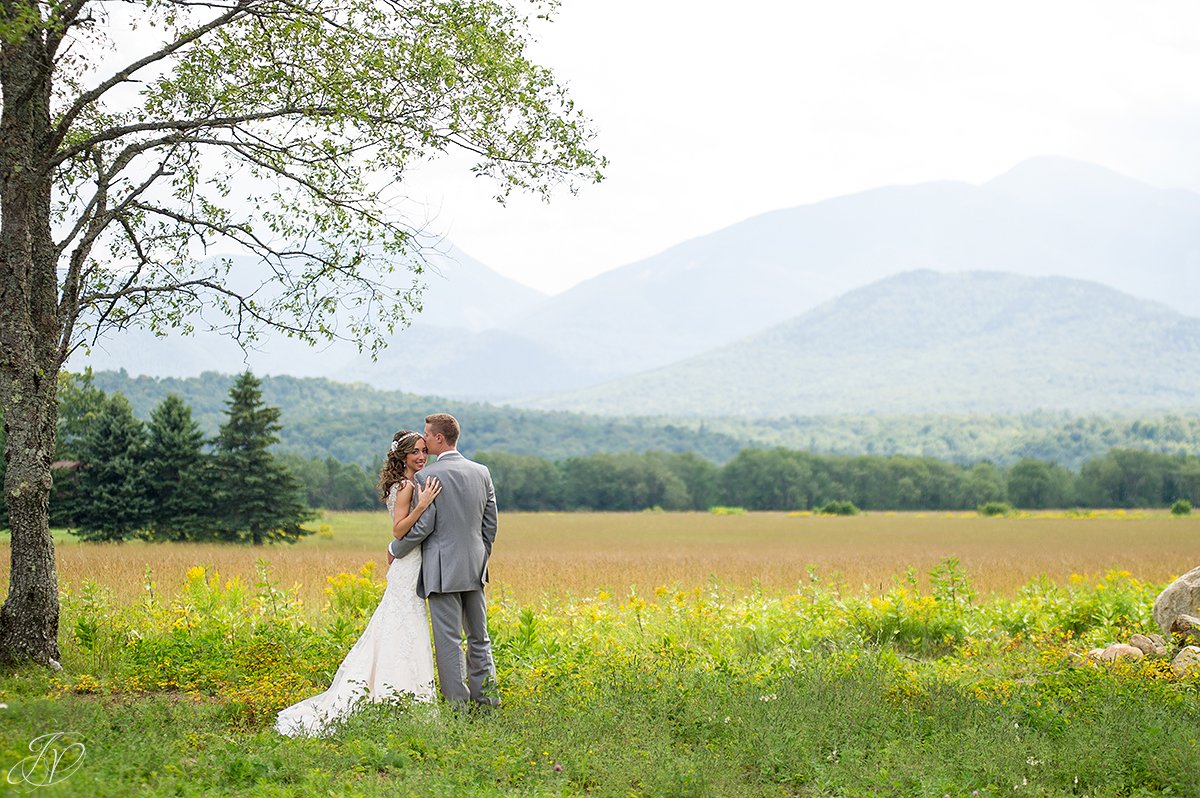 bridal portrait in front of mountain lake placid