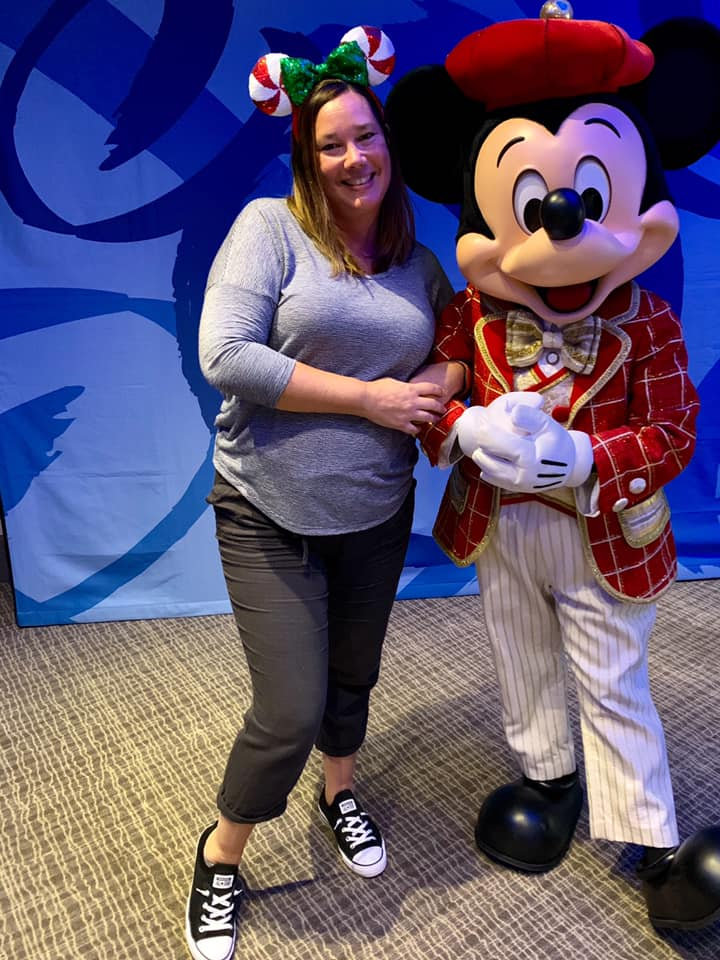 Kelly Furtado of Anchors Away Travel wearing peppermint holiday Mickey ears, Kelly Furtado with Mickey