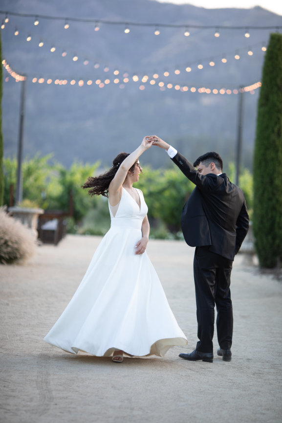 Bride and Groom dancing during sunset photos photographed by Studio J Photography