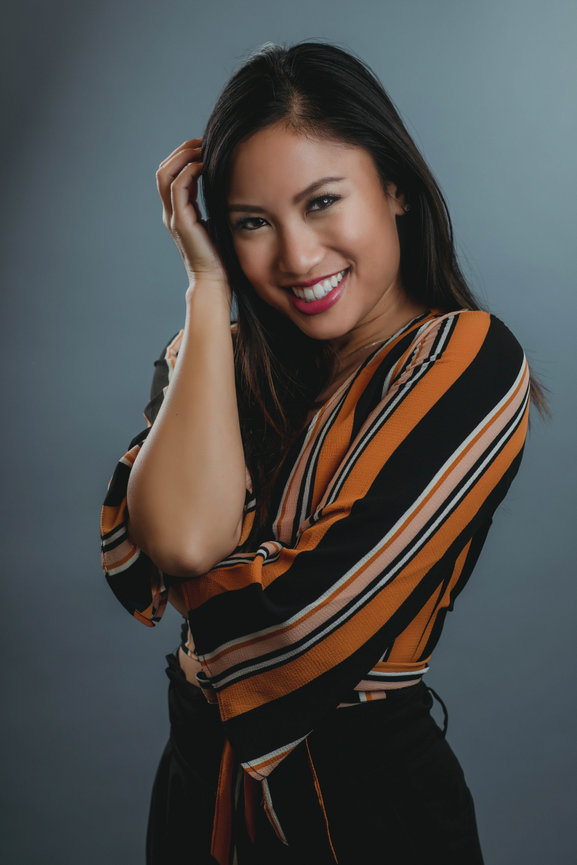 Fun posed and directed headshot in Las Vegas photography studio. Las Vegas professional headshots and team headshots in studio with Adam Trujillo.