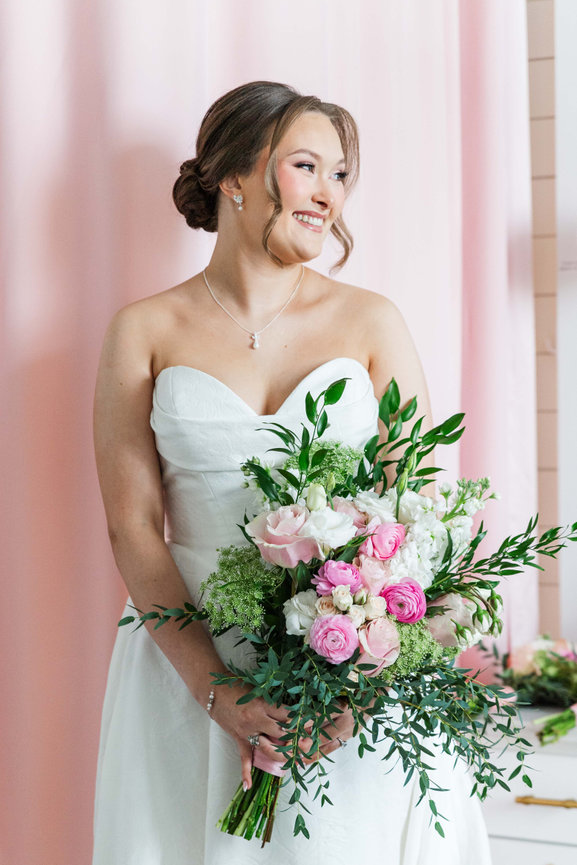 Bride holding a pink and white bouquet during a bridal portrait at The View at Fountains in Murfreesboro, Tennessee