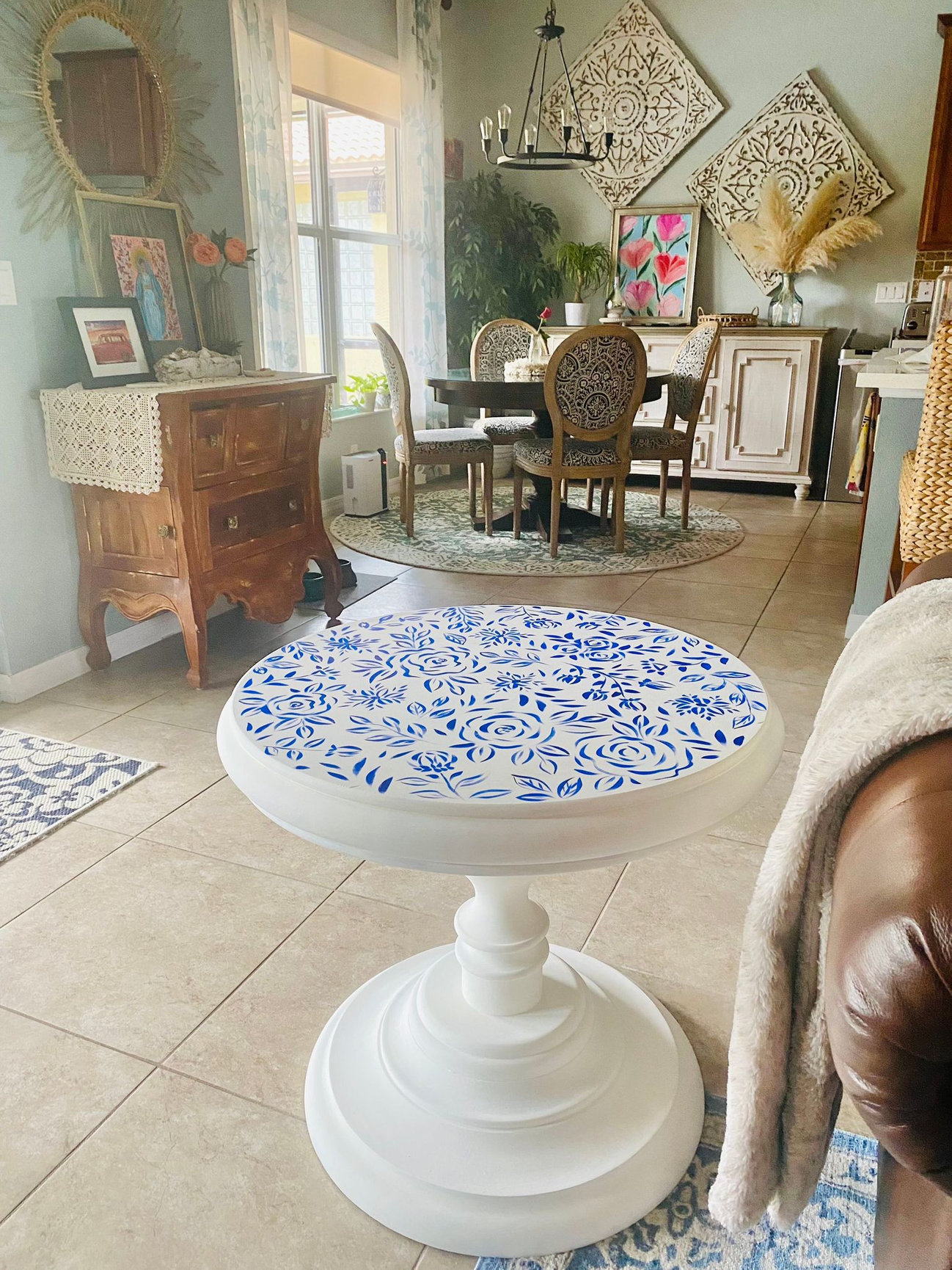 upcycle a wood table with florals - a finished piece - a white wood table thats been chalk painted with a handmade floral design on the top in blue and white