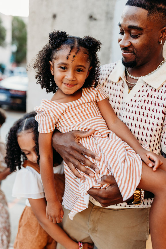 Huntsville Alabama family photoshoot Black father holds daughter