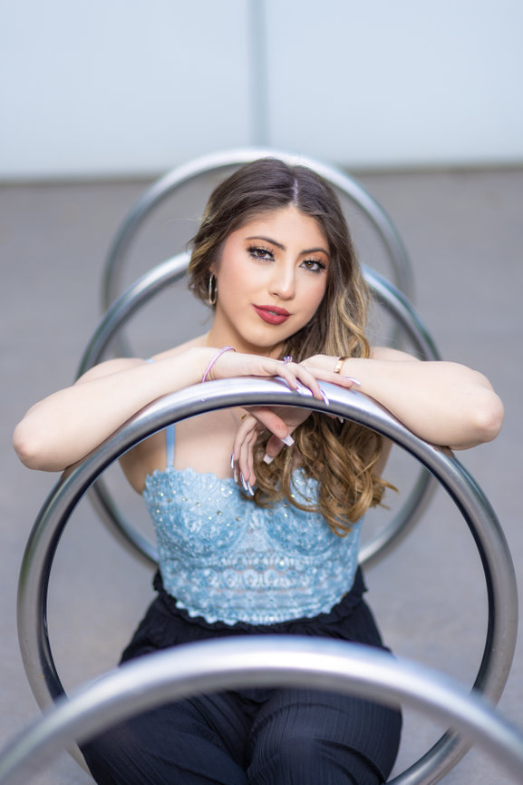 High School Senior Girl sitting in a bike rack Dallas