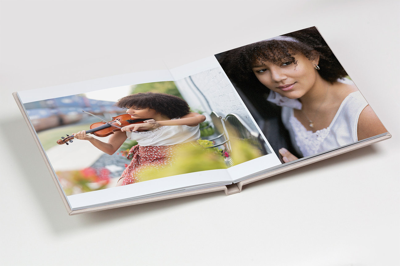 Handcrafted album showcasing a senior portrait experience, presented as a refined and lasting collection of images