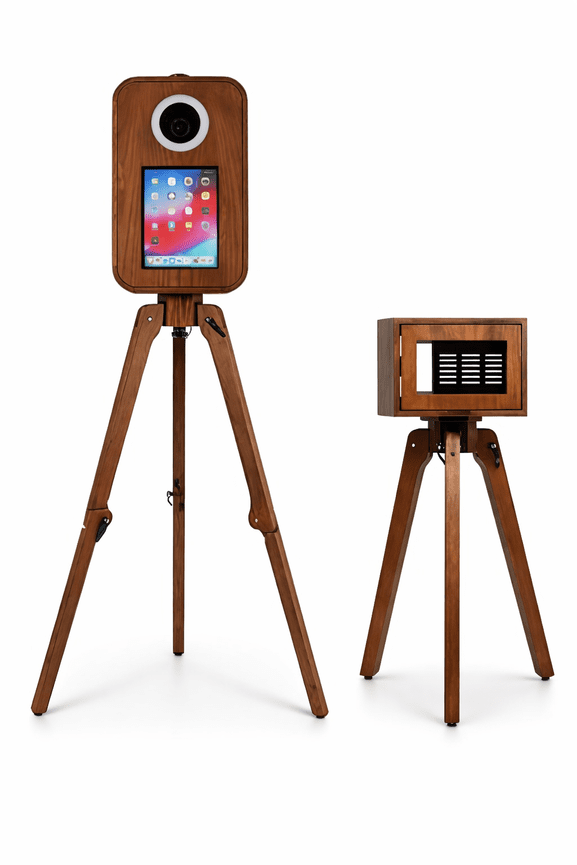 Two vintage-style photo booths on wooden tripods