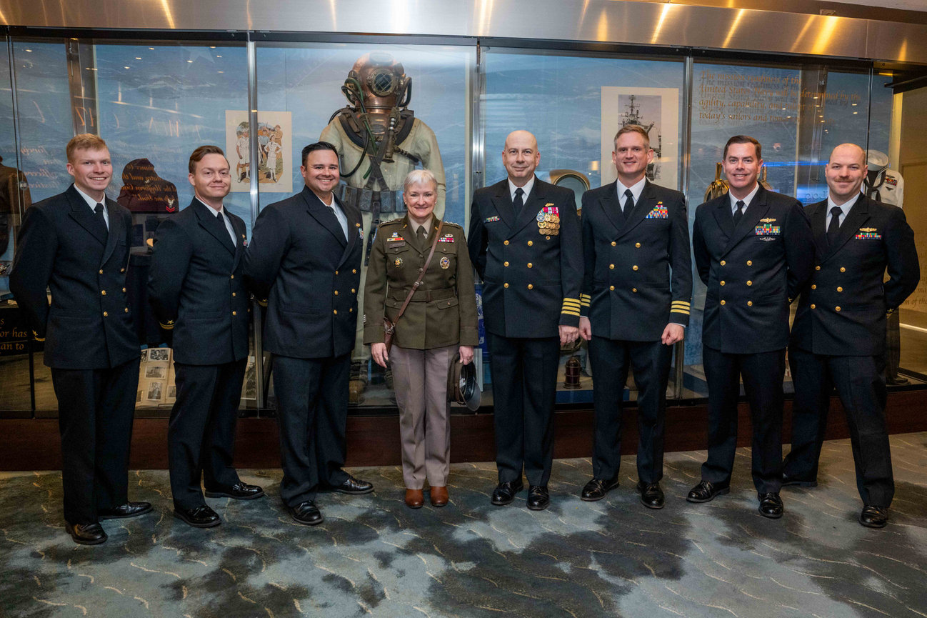 Officers posing prior to a Naval Officer's retirement ceremony