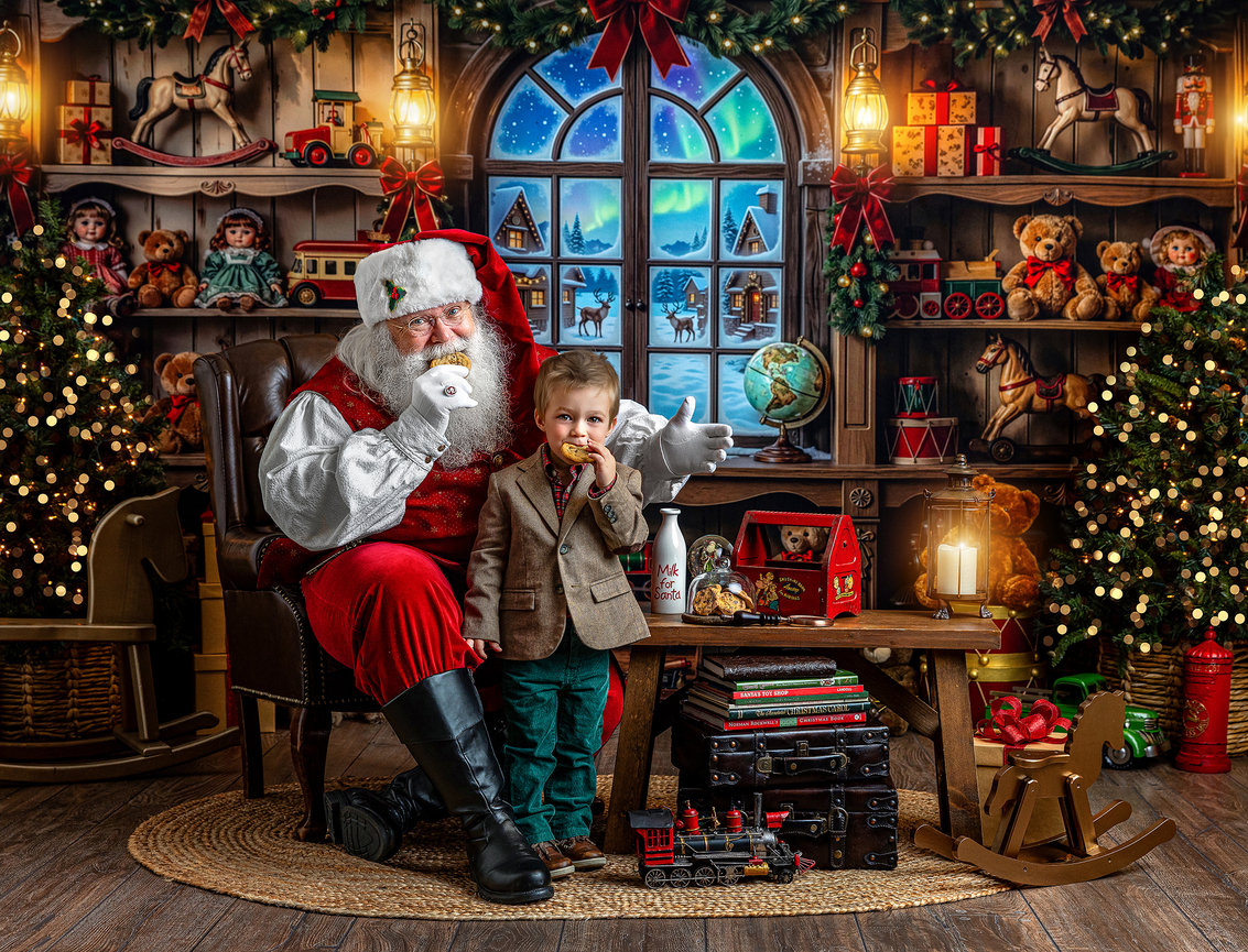 Santa Claus and child enjoying Christmas cookies together during a festive Santa Experience at a Wooster, Ohio photography studio