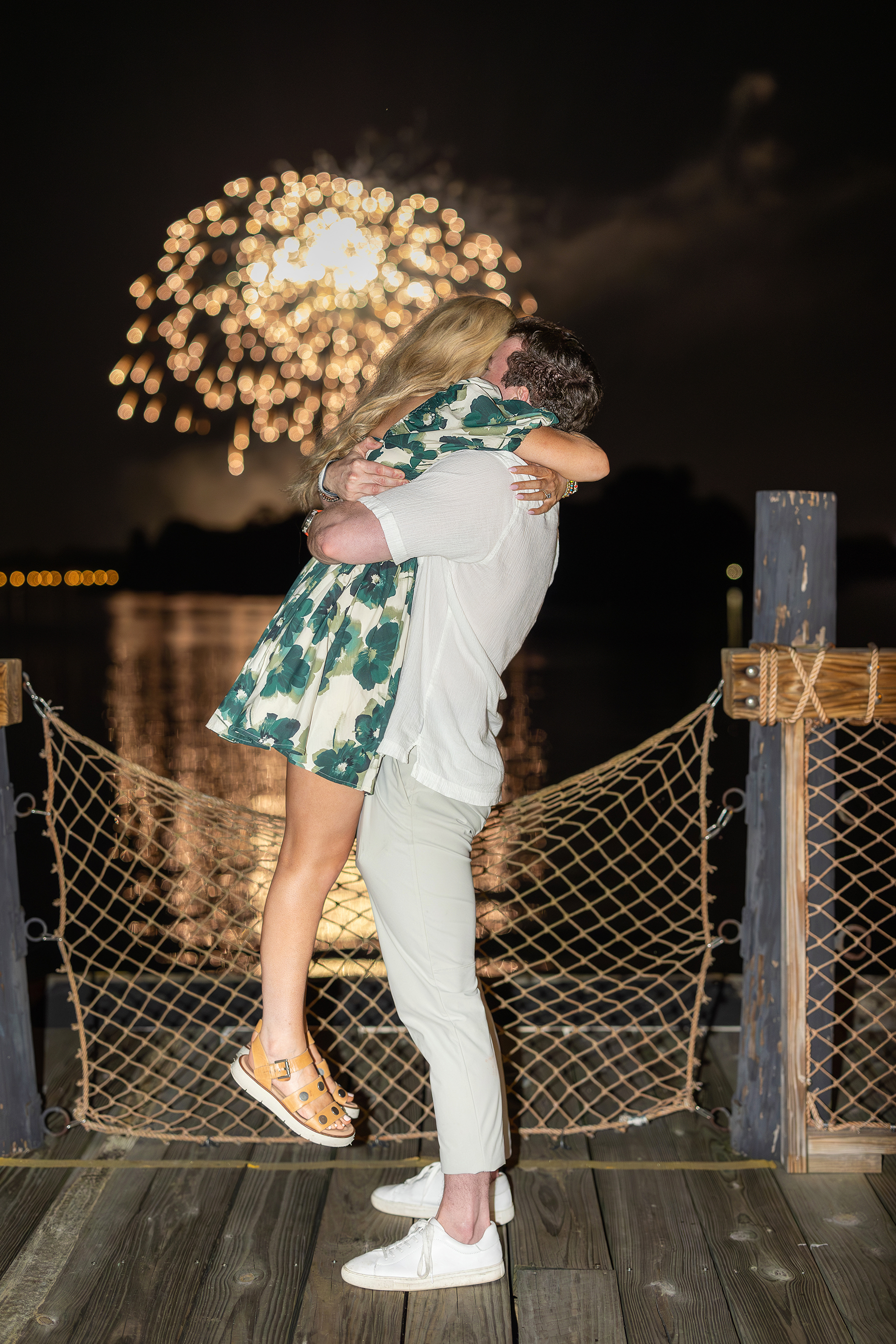 A couple hugs during the fireworks at Disney's Polynesian Resort.