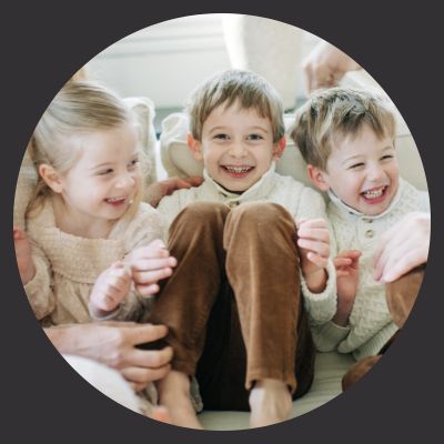 three giggling kids