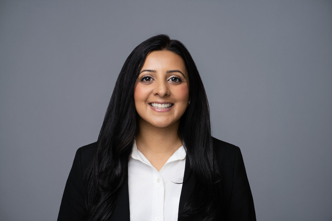 Executive-style professional headshot with studio lighting used for LinkedIn and corporate branding
