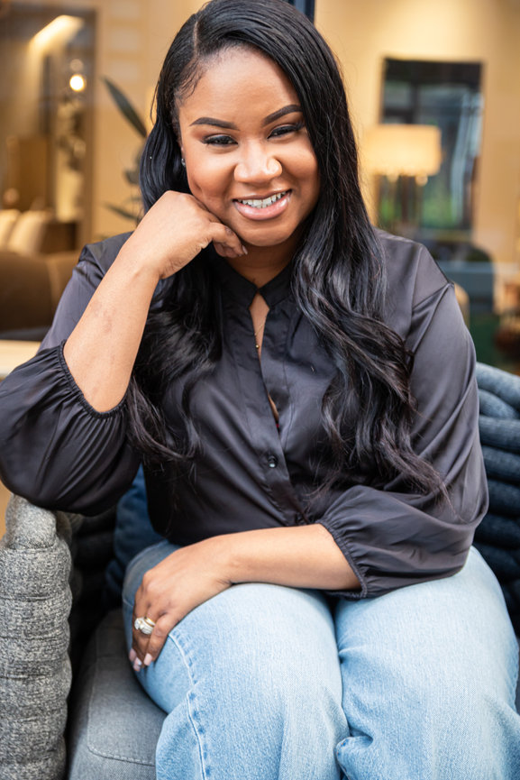 Smiling woman sitting indoors