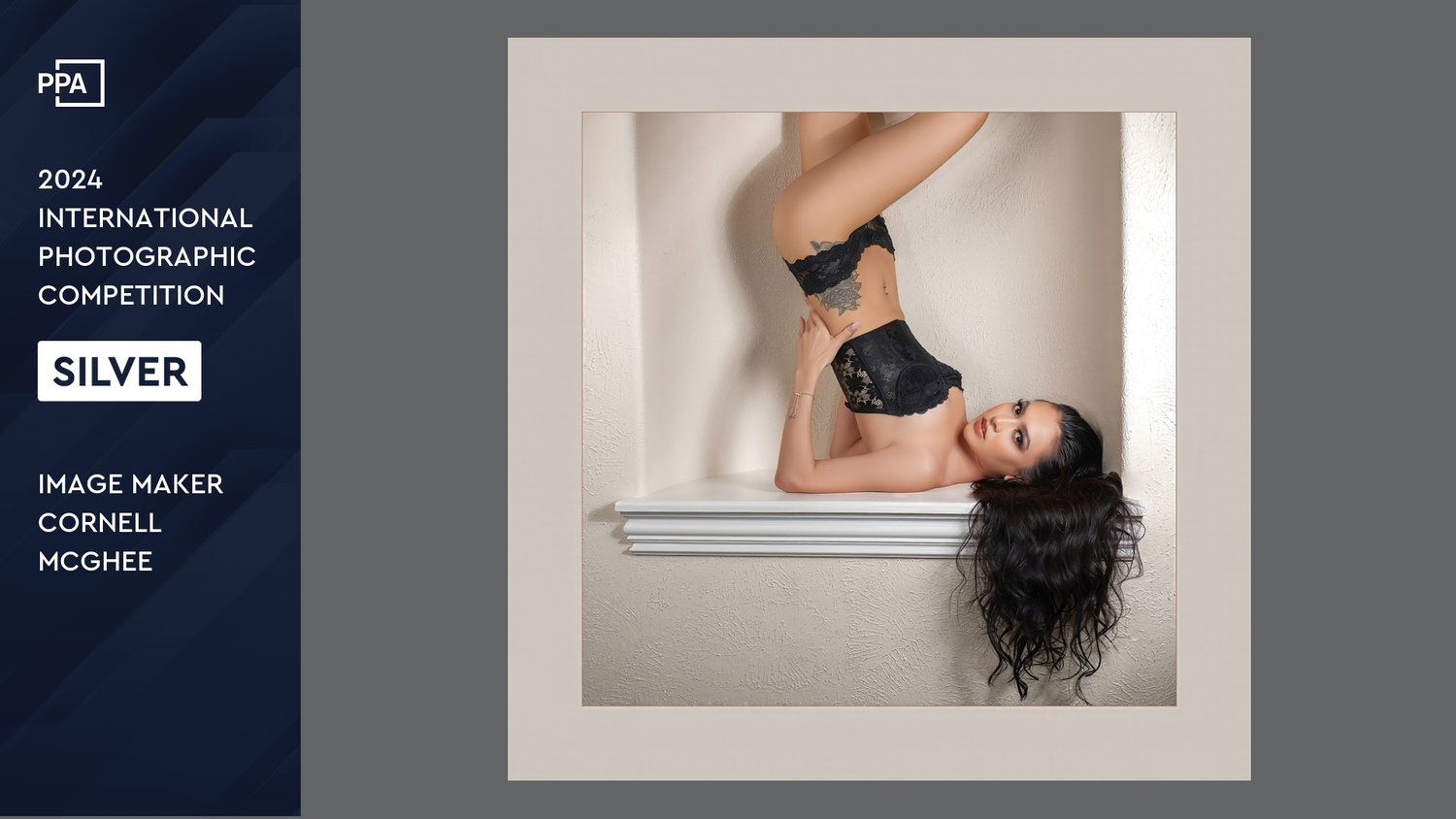 Female model laying upside down in an alcove