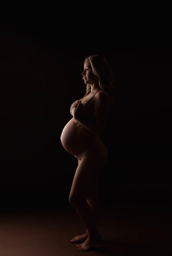 Silhouette maternity photography in studio servicing Calgary and Okotoks