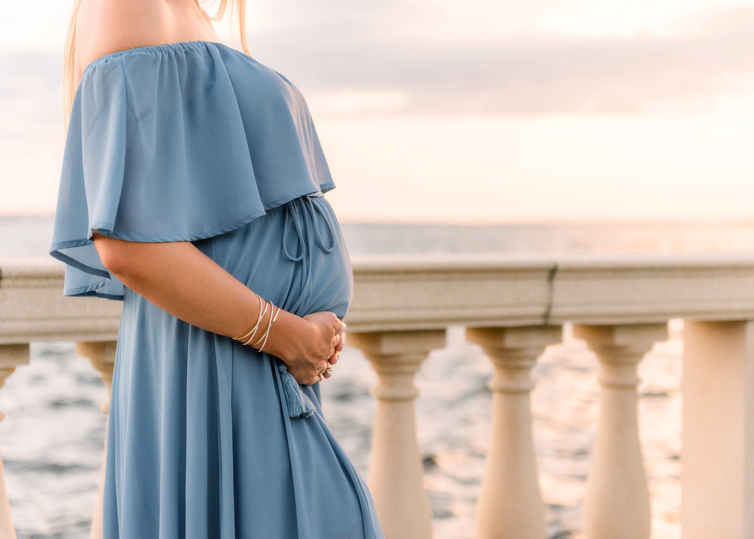 petite baby bump draped in blue, ocean, sunset, spanish architecture