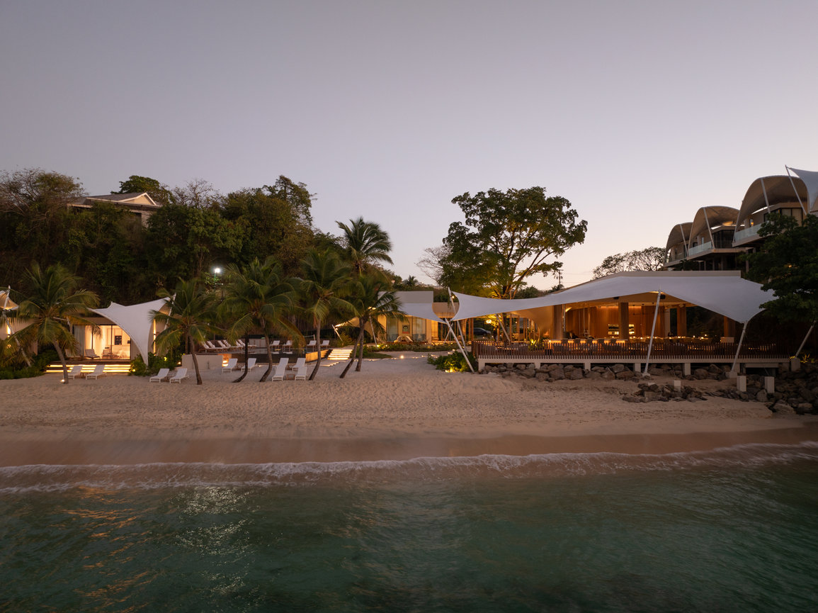 Back of the property from Ocean at Silversands Beach House in Grenada at early evening showcasing the Restaurant.