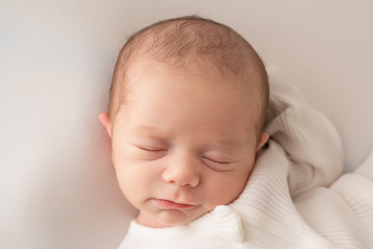 White-on-white newborn portrait with soft tones in Point Pleasant, NJ