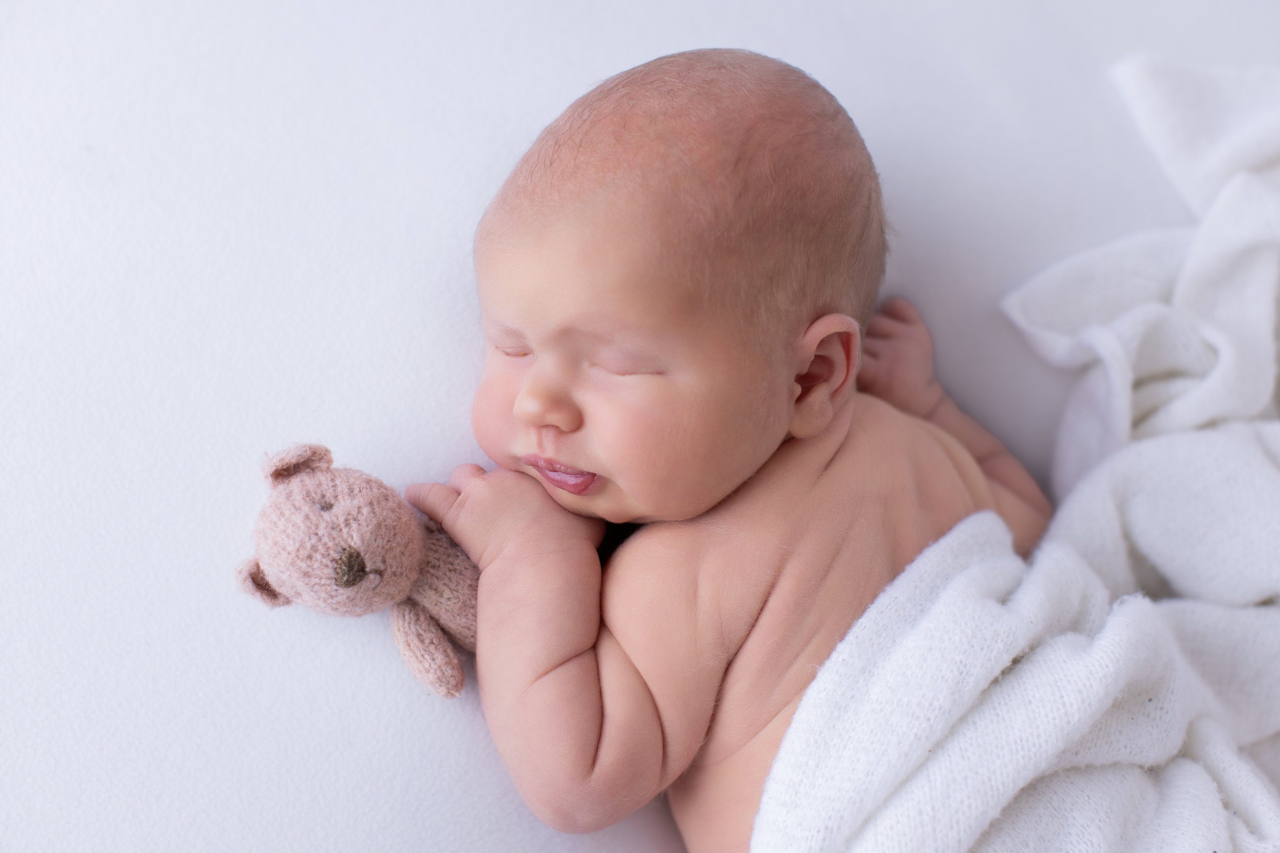 Calgary newborn photography white mauve and big brother love Newborn III session photo 4