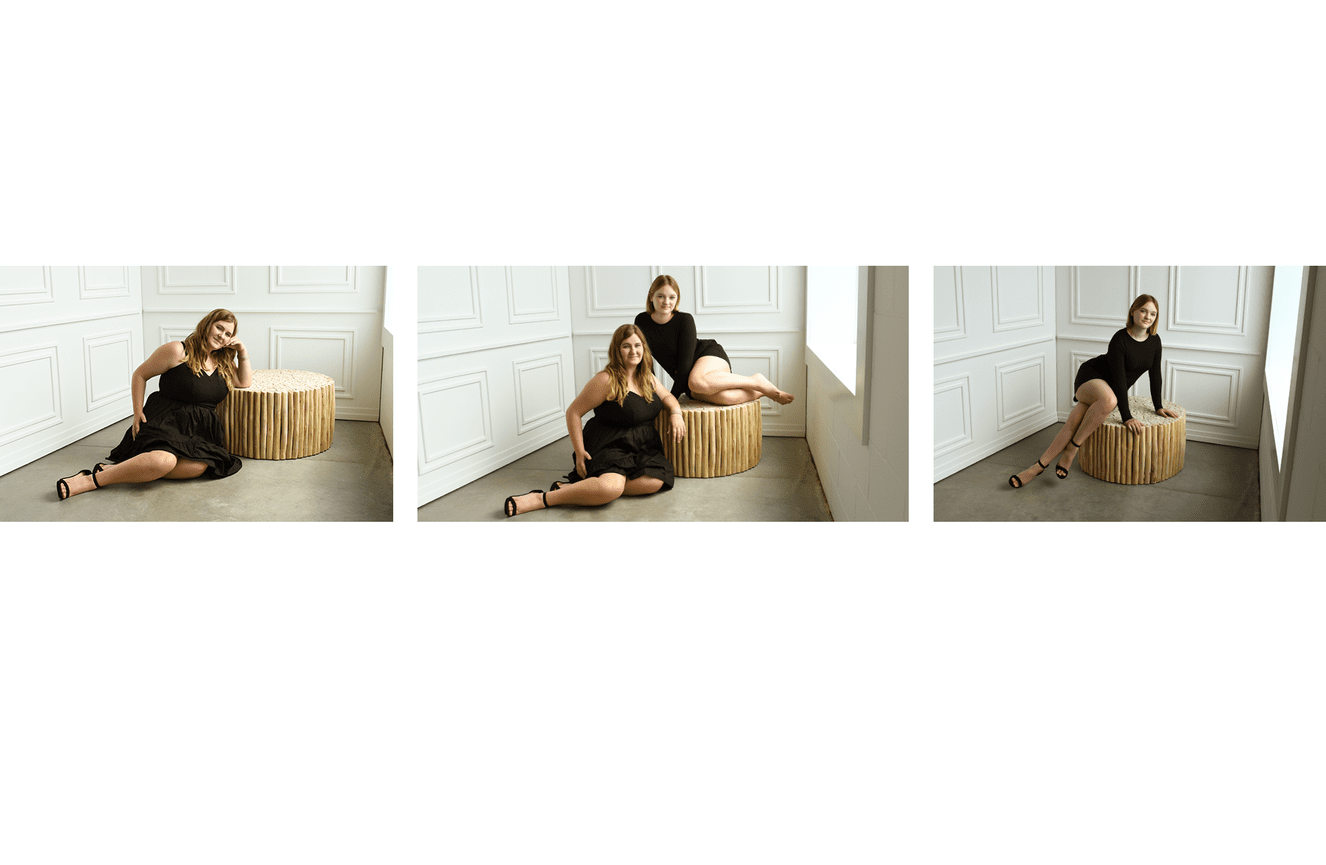 Twins Avery and Sophia wearing chic black dresses to their senior portrait session at the studio of Kliks Photography in Cedar Rapids, Iowa.