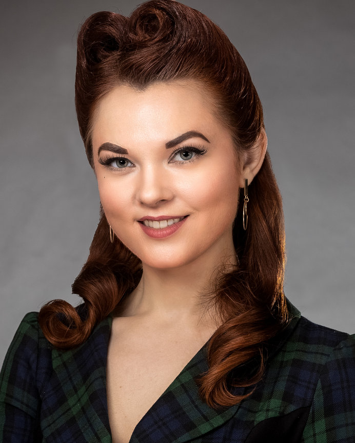 Artistic portrait of a female model with creative styling