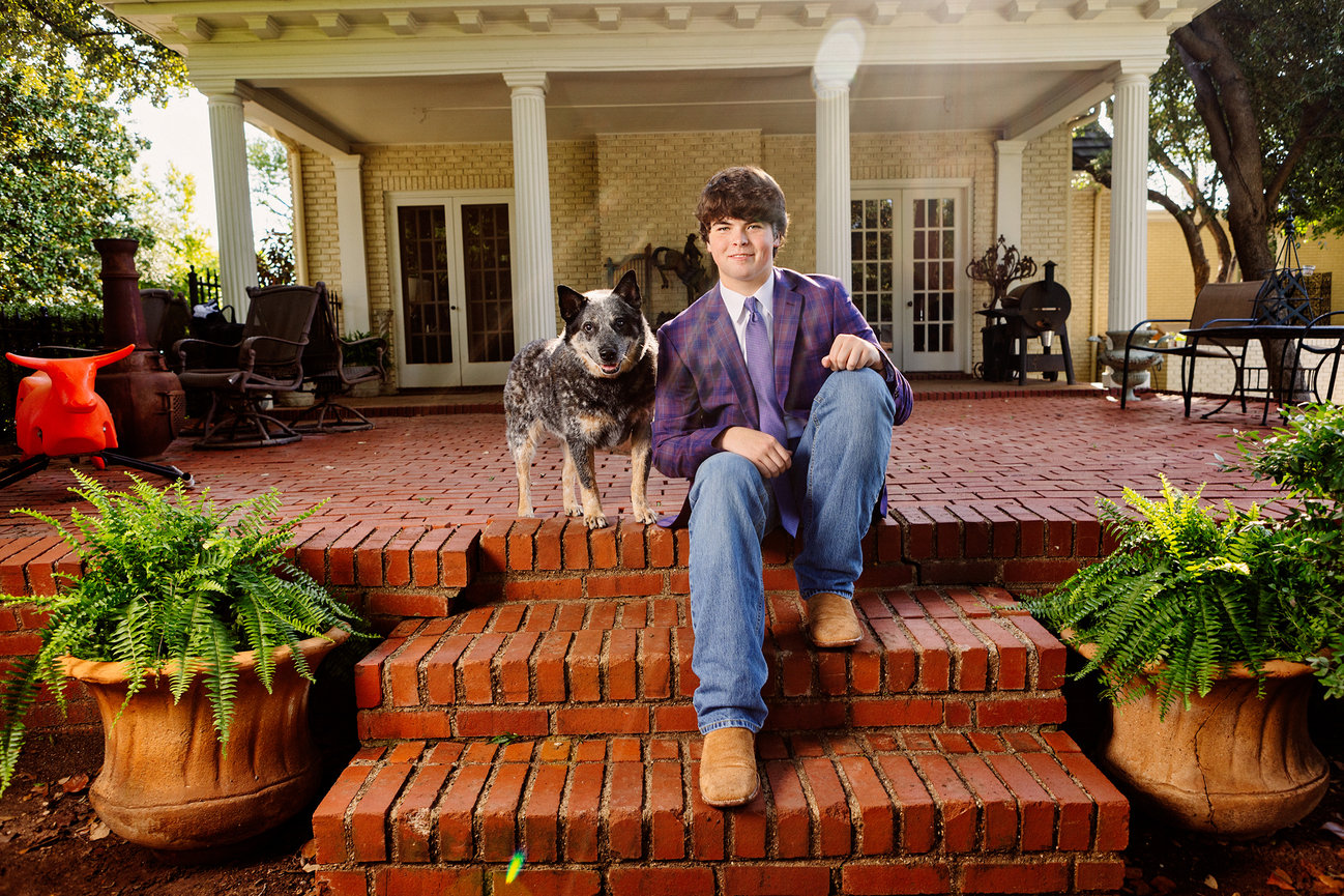 portrait session on the back porch a guy and his dog