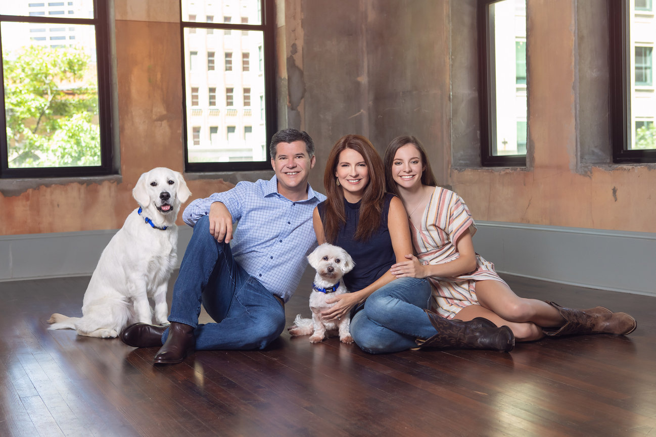Family portrait session including two dogs in dowtown fort worth.